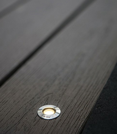 recessed light installed in deck board