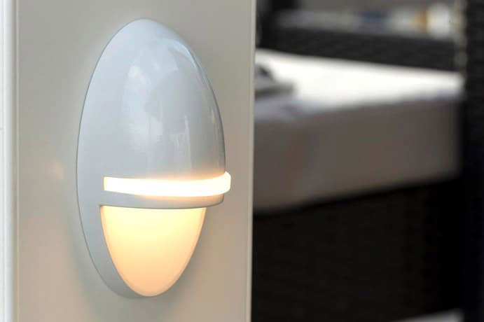 TimberTech accent light installed and illuminated.