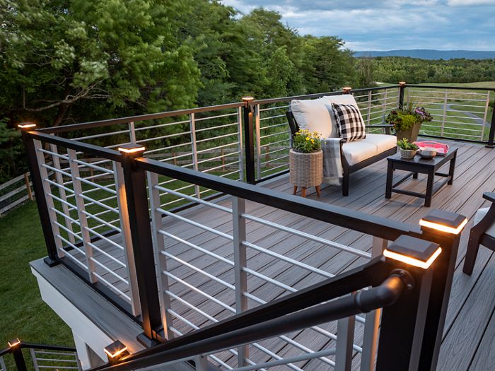 trex signature post caps illuminated and installed on deck posts