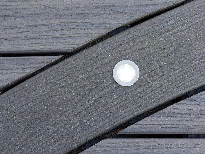 Trex recessed deck light installed in Trex deck board