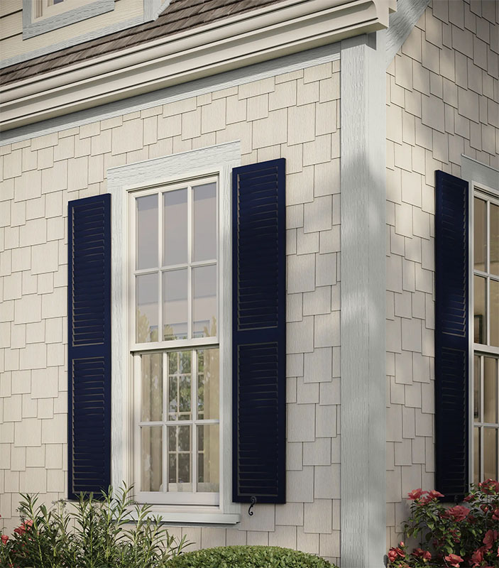 Hardie panel in cedarmill texture, shingle irregular cut, trim colour artic white